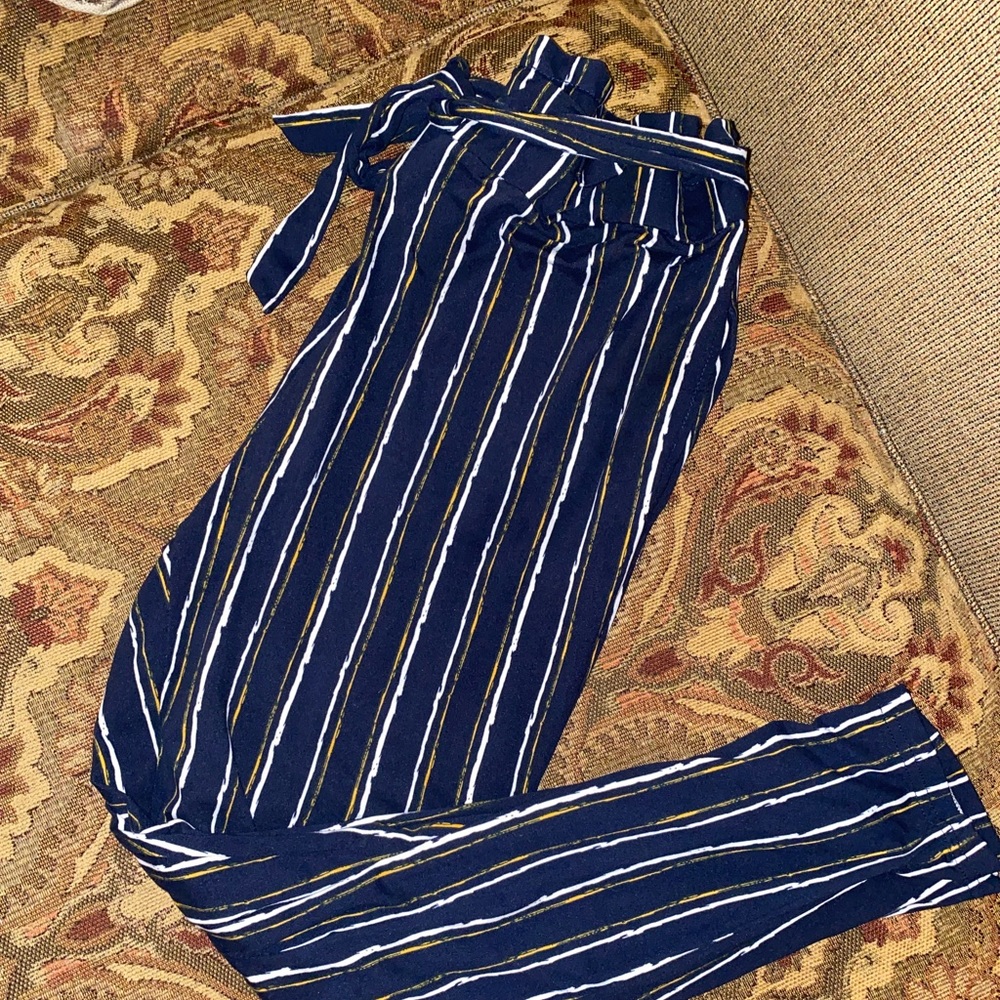 Size small navy blue soft and stretchy paper bag pants. Perfect condition